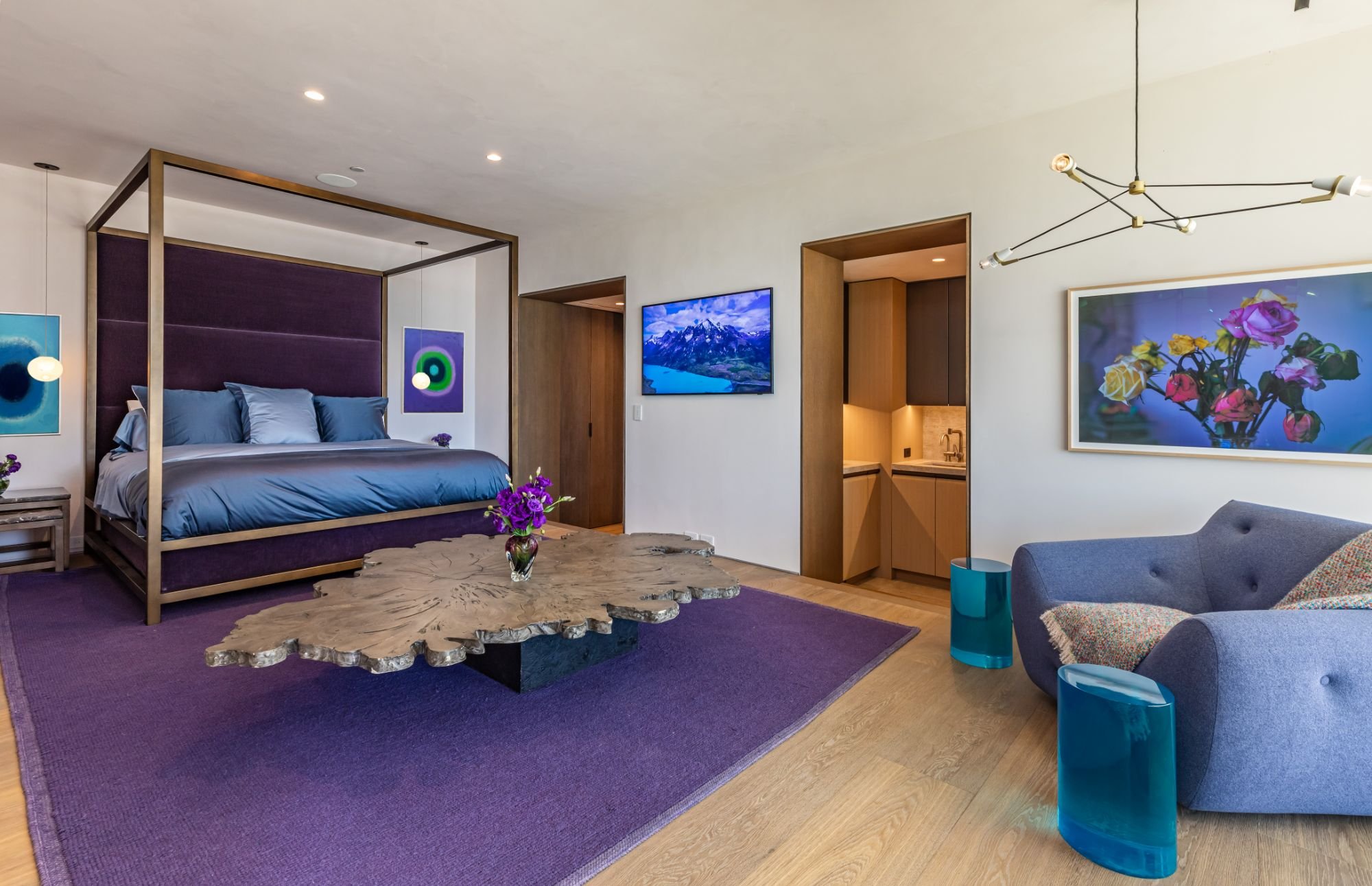 Getty House — master bedroom with canopy bed and live-edge coffee table