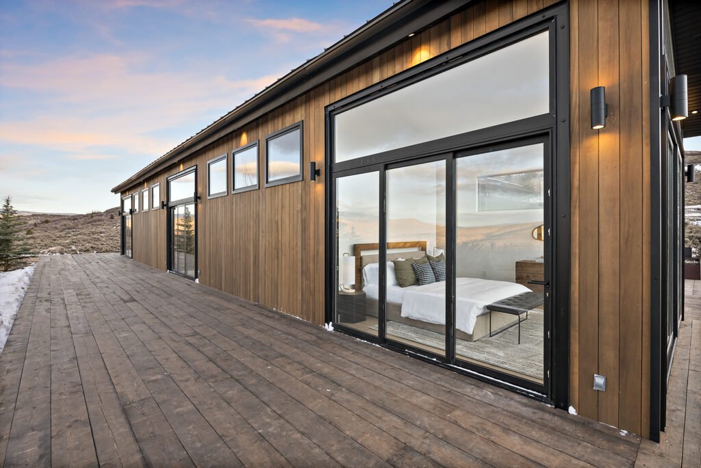 Icon Haus — Icon House Benloch Heber City Exterior Deck Master Bedroom Glass Sliding Doors Wood Siding  Modern Custom