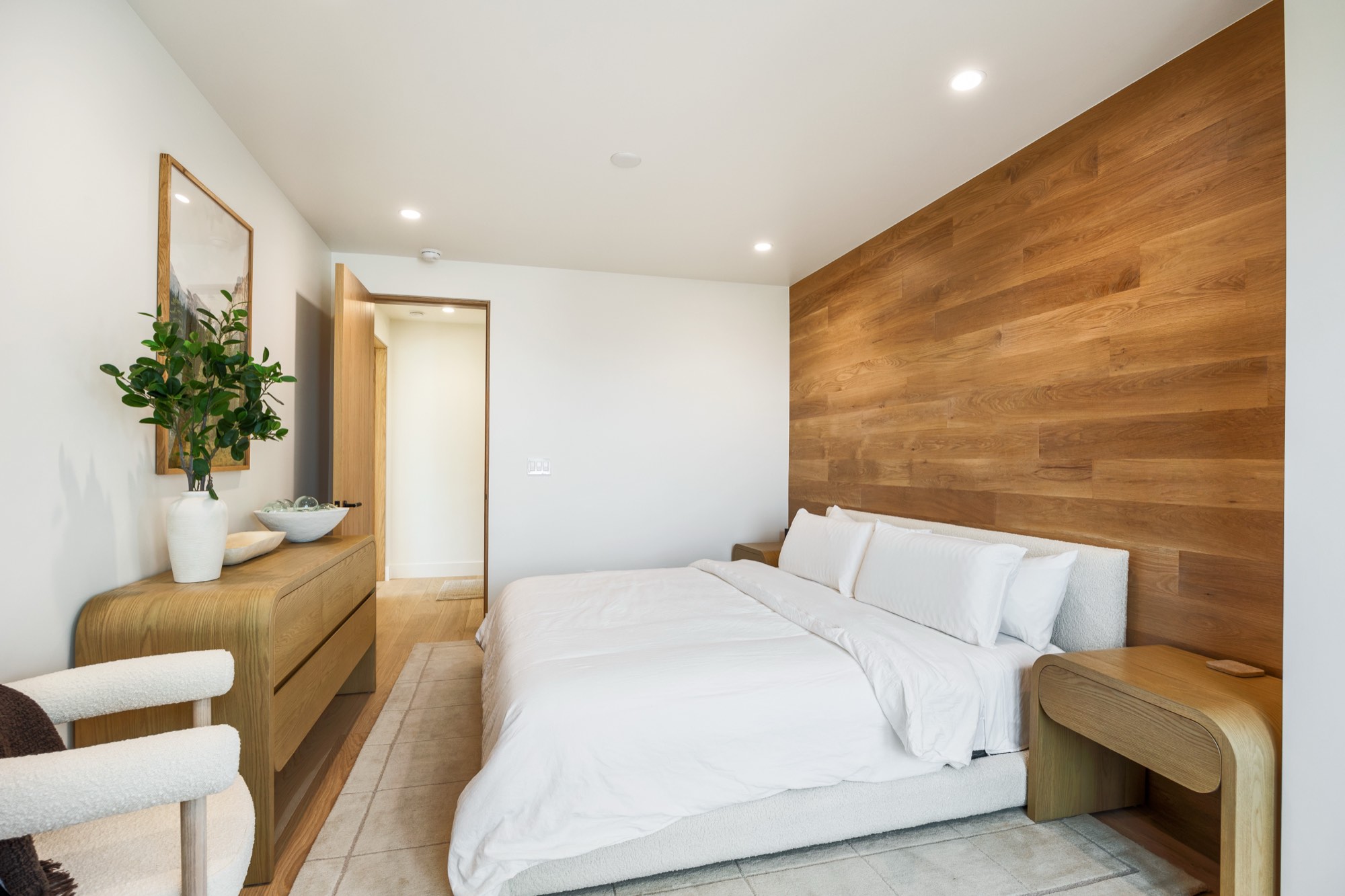 Islay Way — guest bedroom with walnut accent wall