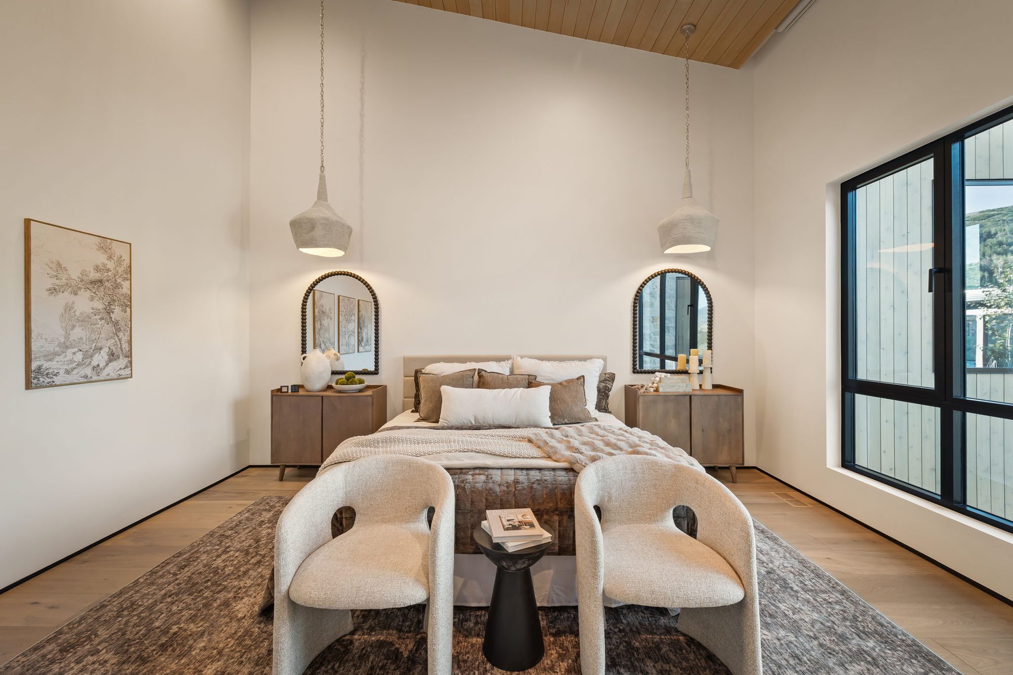 Lumen — bunk room with twin beds, arched mirrors and black-framed windows