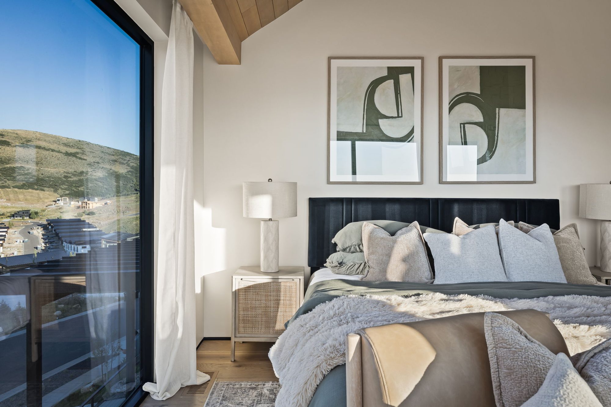Lumen primary bedroom with corner glass over the valley