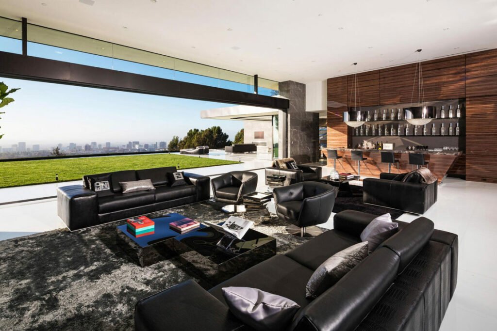 Stradella — contemporary kitchen with stone island and free-flowing glass