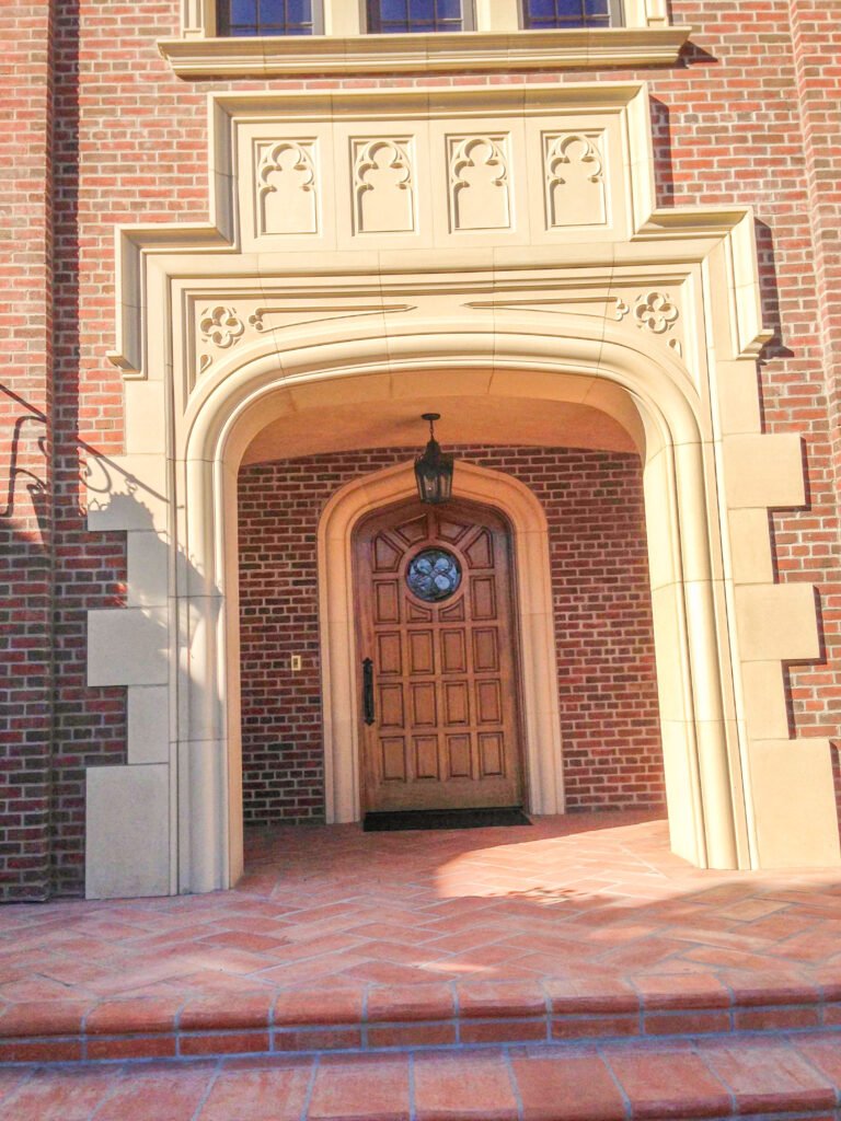 White Stallion — brick and precast detailing with cathedral glazing