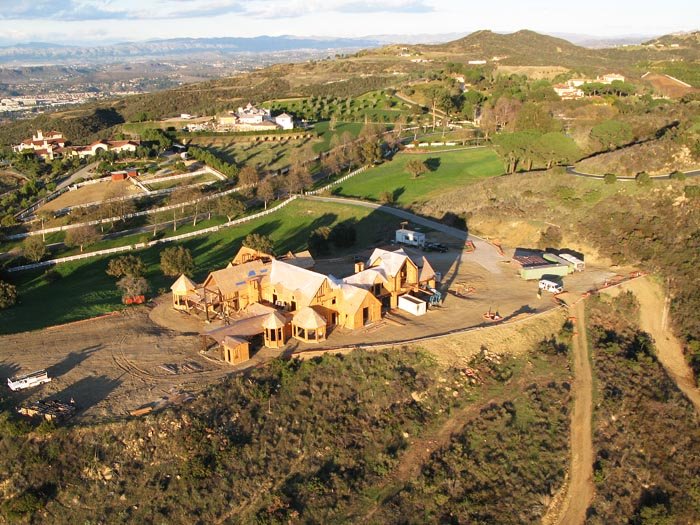 Roderick Builders reviewing framing on a luxury custom home under construction